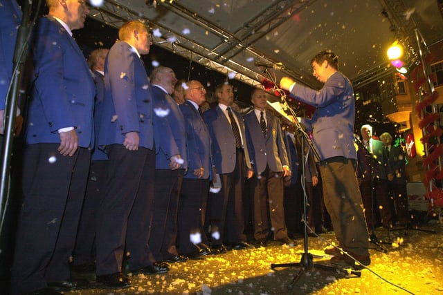 Bolsterstone Male Voice Choir on stage at the 2001 Sheffield City Centre light switch on