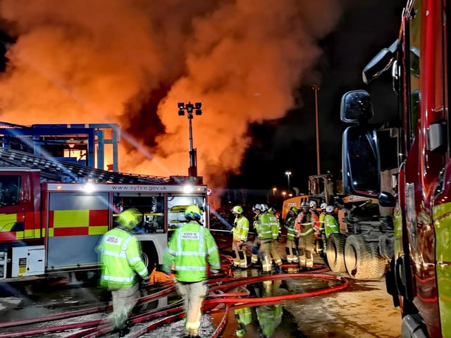 Dramatic pictures show firefighters at the scene of the blaze at Balby Carr Bank recycling site, this evening. PIcture: South Yorkshire Fire and Rescue Service