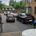Cars blocking the entrance to Castle Croft Drive in Norfolk Park, Sheffield - a resident who uses a wheelchair has described how her way in was blocked by cars on the road and pavements. Picture: Castle Croft Drive resident
