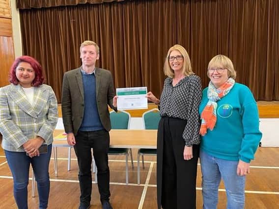 Lee Rowley MP (second from left) congratulates Shelagh Cheetham (second from right) and the rest of the Crafting2gether team.