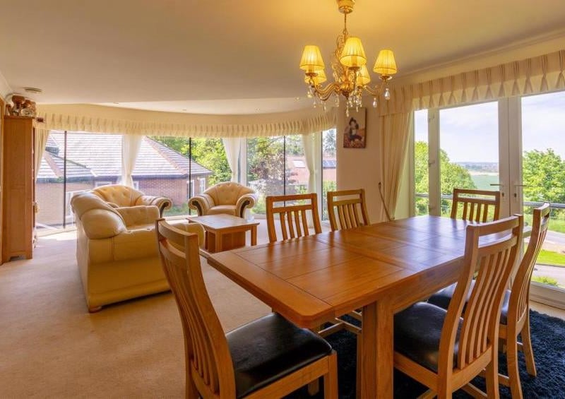 The dining area in the main reception room of the New Mill Lane property. Bright and spacious.
