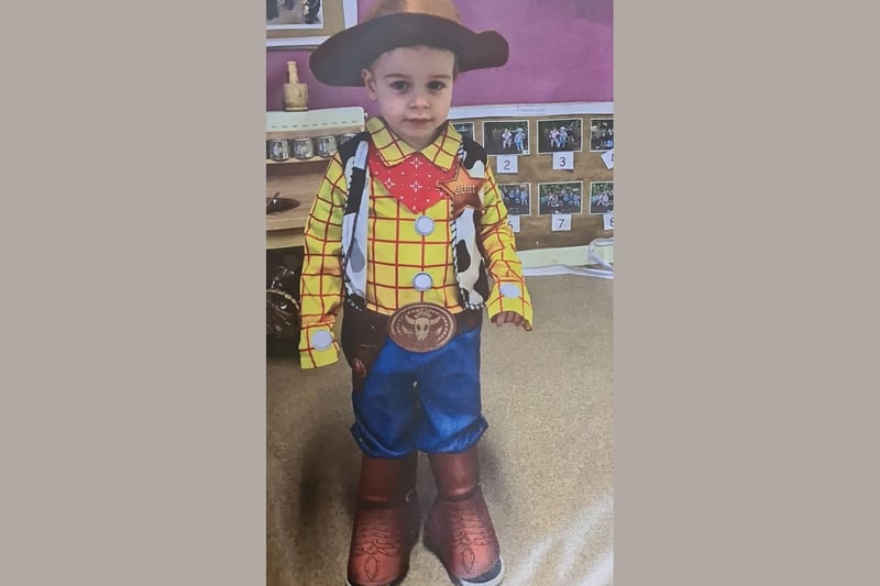 Kai age 2 dressed as Woody from Toy Story.