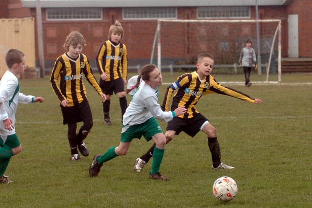 These young Whitburn & Cleadon players, pictured in black and yellow are up against Sherburn Youth FC u10s in this Russell Foster match from ten years ago.