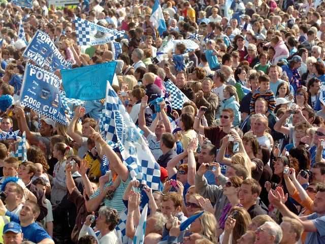 The magical moment the fans see the players. FA Cup Pompey parade. Picture: Malcolm Wells 082235-283