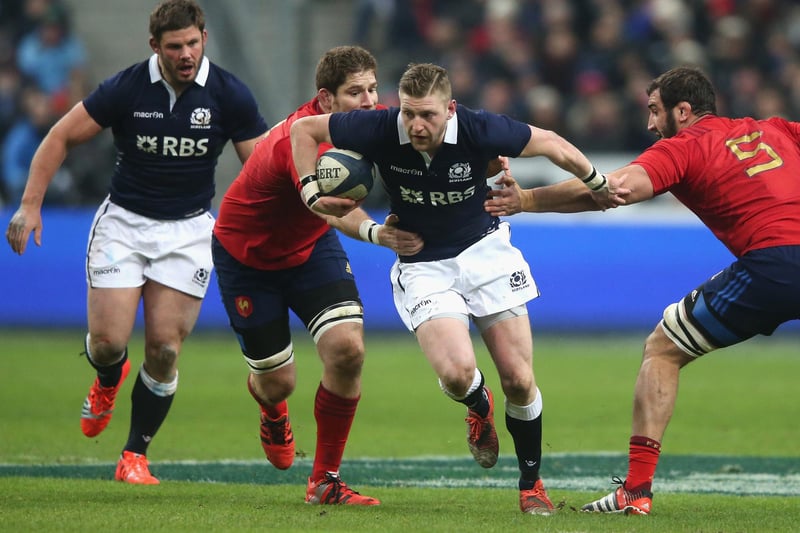 February 7, 2015, Six Nations: France 15, Scotland 8
Finn Russell, watched by Ross Ford, weaves between Pascal Pape and Yoann Maestri during the RBS Six Nations match between France and Scotland at the Stade de France on February 7, 2015, in Paris. (Photo by David Rogers/Getty Images)