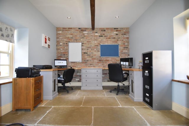 The office space is generous in size and currently accommodates two desks for home working, with plenty of additional room for storage.