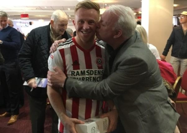 Steve Stubbs aka @annies_song_ on Twitter shared this photo of him planting a kiss on 'Bounce Killer' Mark Duffy.