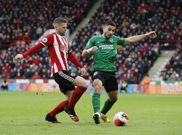 Oliver Norwood of Sheffield Utd tackles Neal Maupay of Brighton: Simon Bellis/Sportimage