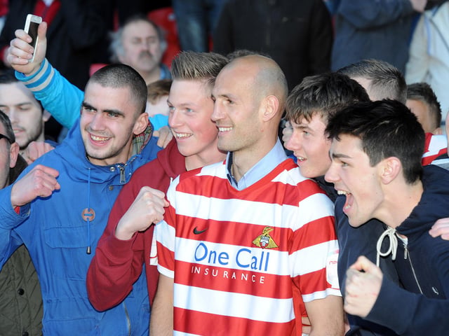 Rob Jones celebrates with supporters