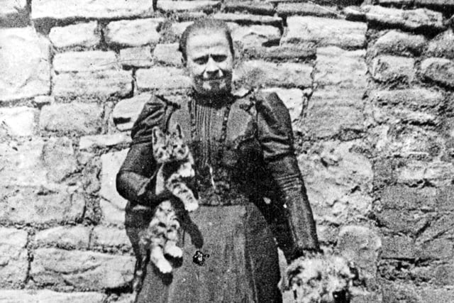 A photograph taken after the floods of Mrs Kirk, who saved her cat and dog during the Great Sheffield Flood 1864