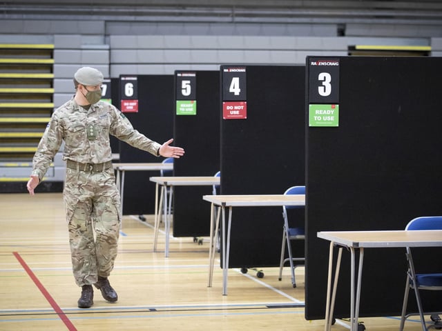 Members of the Royal Scots Dragoon Guard carry out a reconnaissance before setting up a Covid–19 vaccination centre at the Ravenscraig Regional Sports Facility in Motherwell