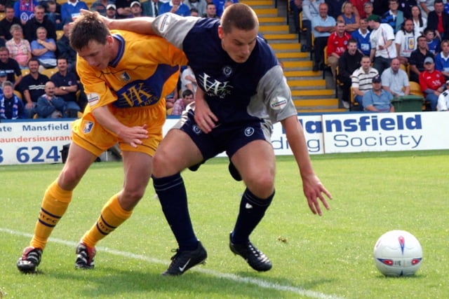 Stags' Colin Larkin and Chesterfield's Kevin Dawson clash as the Spireites run out 2-0 winners in August 2002.