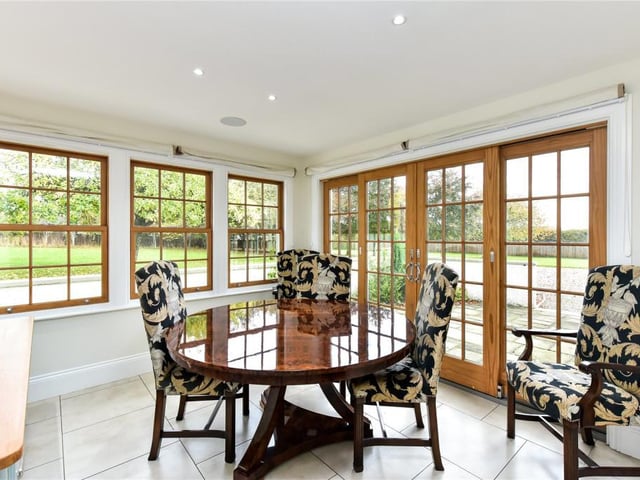 Sun room with doors to a south facing terrace.
