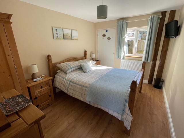 This four bedroom converted barn in Totland Bay, Isle of Wight, is on the market for £1.1m. It is listed by Fine and Country.