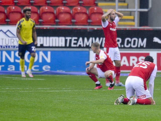 Rotherham United players stunned by the last minute Huddersfield Town equaliser
