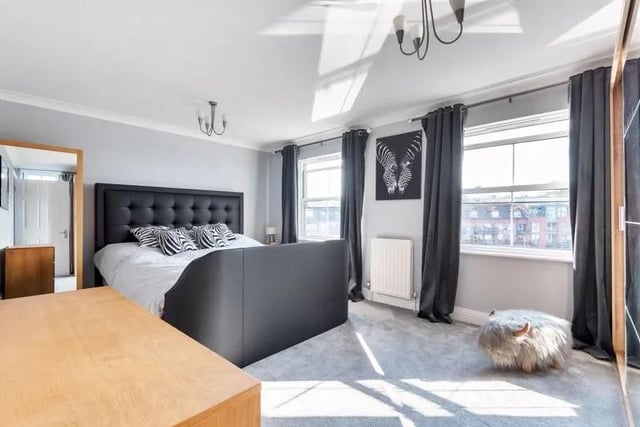 This four bedroom terraced home with views over Camber Dock, Old Portsmouth is on sale for £950,000. Here's what one of the bedrooms looks like.