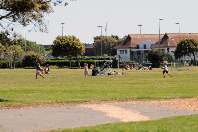 People were socially distancing on Southsea Common on Thursday, May 21 - the hottest day of the year. Picture: Sarah Standing (210520-2443)