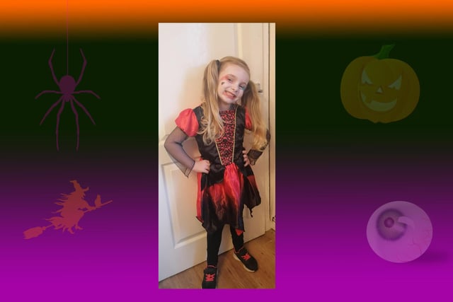 Isobelle age 5 as comic book character Harley Quinn from Batman.