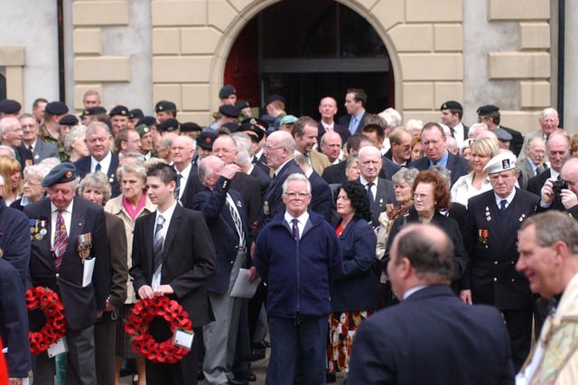 An anniversary service in 2005 paid tribute to the heroes of the war. Do you recognise anyone in the photo?