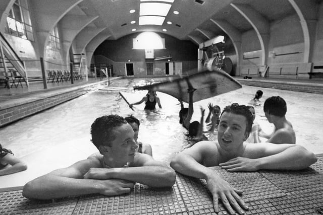 Karl Peacock and Ian Gardener take a rest as youngsters enjoy their last day at Derby Street baths.
