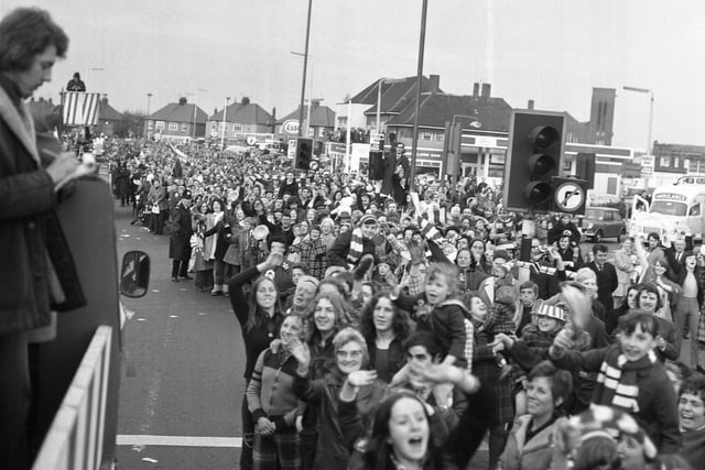 Look at the scenes for the FA Cup parade at the Barnes roundabout, with the Esso garage in the picture.