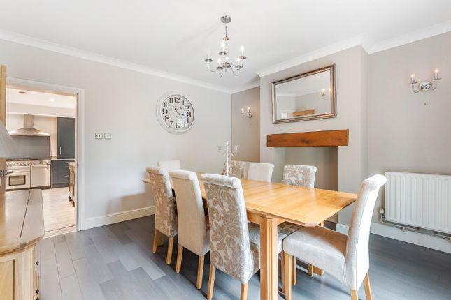 The dining room lets in plenty of light and has doors leading to the garden