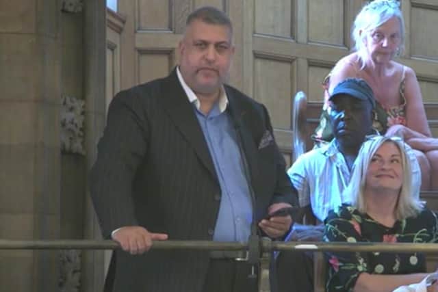 Abid Hussain speaking in Sheffield Town Hall during full council public questions