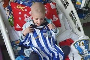 Alfie in Sheffield Children's Hospital where he was visited by Sheffield Wednesday players.