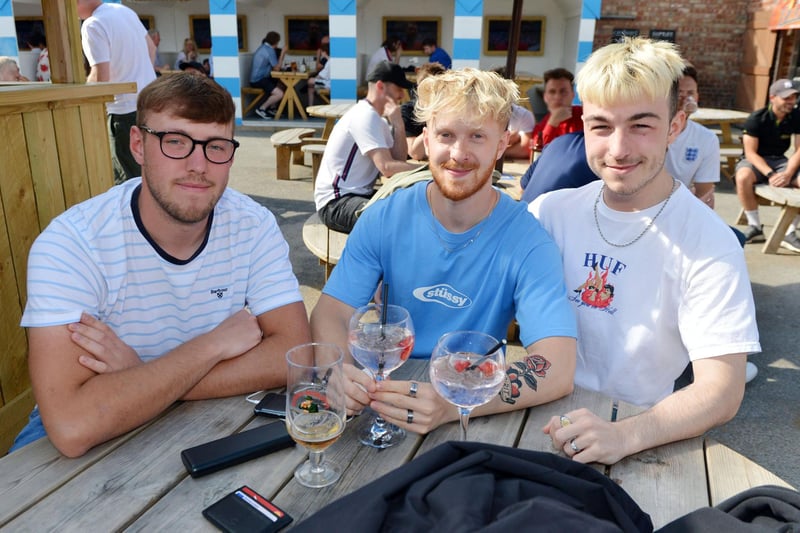 Fans in Chesterfield watch the England v Germany game at the Spotted Frog. Kian Woodgeah, Cale Hood and Kane Warren.