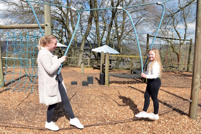 Lucy McCabe and Millie Bostock pictured playing in the playground at Hilltop Park, which overlooks the 60-acre estate.