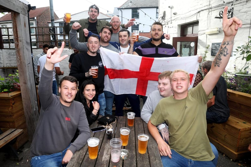 England fans pictured at the Milton Arms in Portsmouth, UK, about to watch England play on TV in the Semi-finals at Wembley. Pictured are fans enjoying the night. Picture: Sam Stephenson