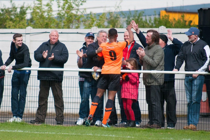 Andy Ofosu celebrating a Worksop Town goal with supporters back in 2015.