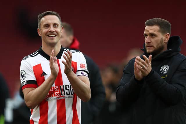 SHEFFIELD, ENGLAND - MAY 23: Phil Jagielka of Sheffield United clapping the fans following the Premier League match between Sheffield United and Burnley at Bramall Lane on May 23, 2021 in Sheffield, England. A limited number of fans will be allowed into Premier League stadiums as Coronavirus restrictions begin to ease in the UK. (Photo by Jan Kruger/Getty Images)