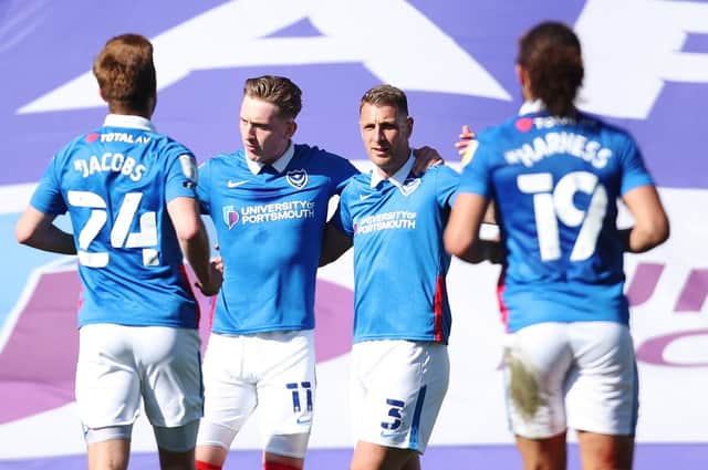 Ronan Curtis, second left, celebrates his goal against Rochdale on Good Friday