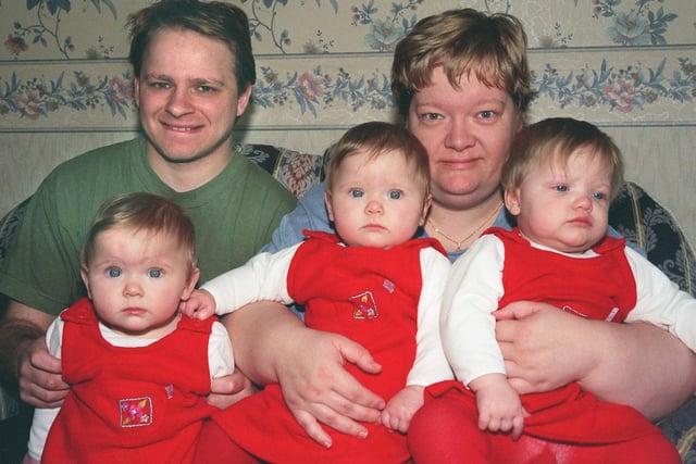 Darren Billau and Jaqueline Jessop with their triplets Mary, Rosie and Hetty at home in Wincobank.