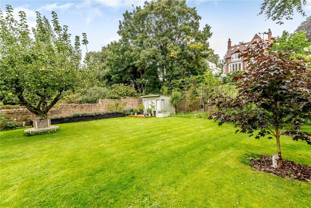 This glorious home also has a beautiful garden to while away the hours in