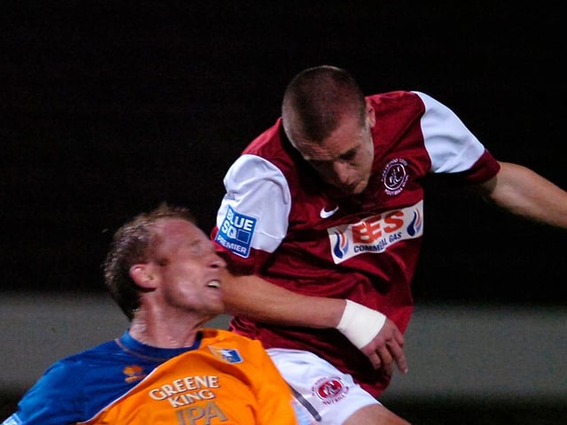 Paul Bolland, pictured challenging Jamie Vardy for a header,  signed for Stags on 1 June 2011. He struggled to hold down a first team place and made 10 first team appearances which saw him have two loan spells at Harrogate during that time.