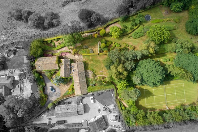This aerial shot shows the vast gardens and grounds this property has in colour. The views from the gardens and the rest of the property over the surrounding valleys are tremendous as well.