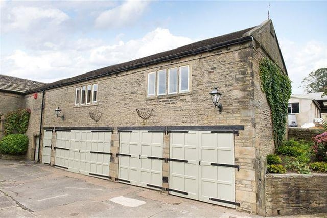 The property boasts a range of outbuildings.
