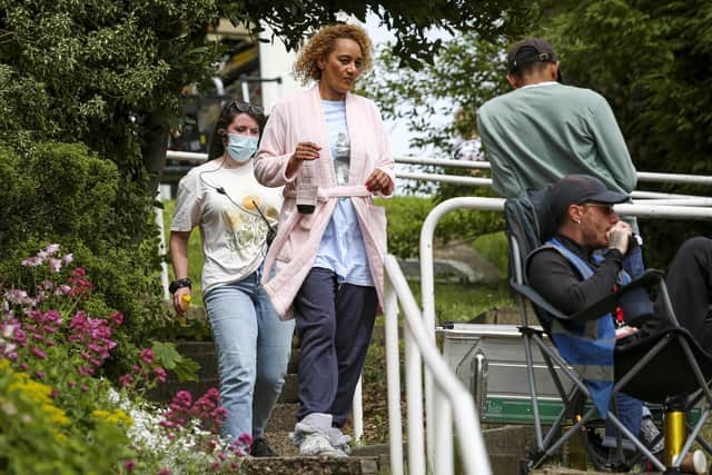 Ex Corrie actress Tupele Dorgu at the new Full Monty with Disney+ being filmed at Gleadless Valley in Sheffield, May 18 2022. See SWNS story SWLEfilming