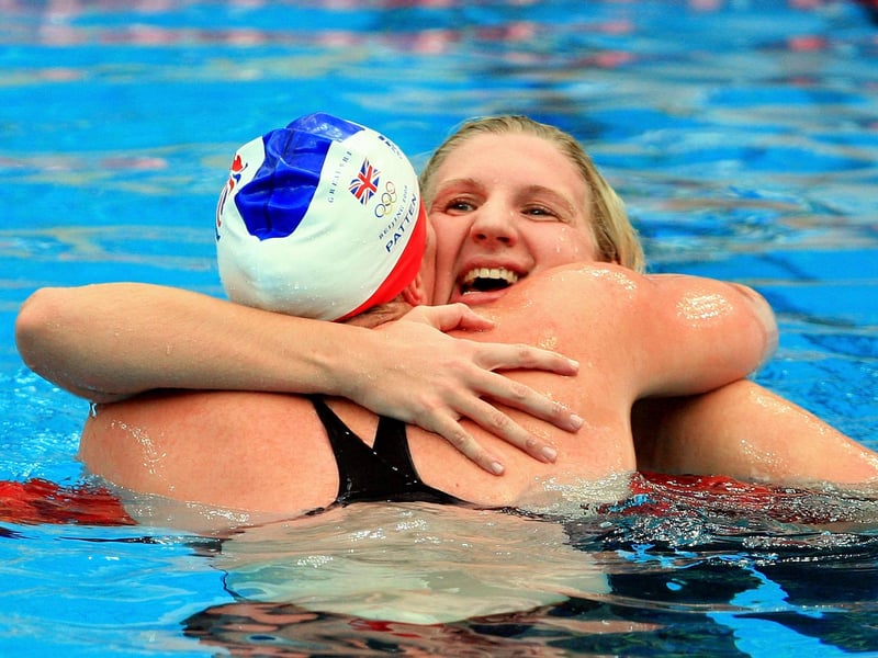 Cassandra Patten congratulates Rebecca Adlington on her victory in the Women's 800m Freestyle Final.