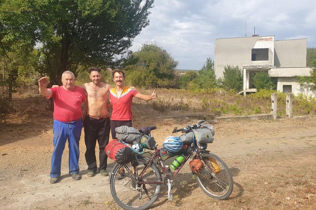 Mike (right) with two of the generous Bulgarians who welcomed him into their homes.