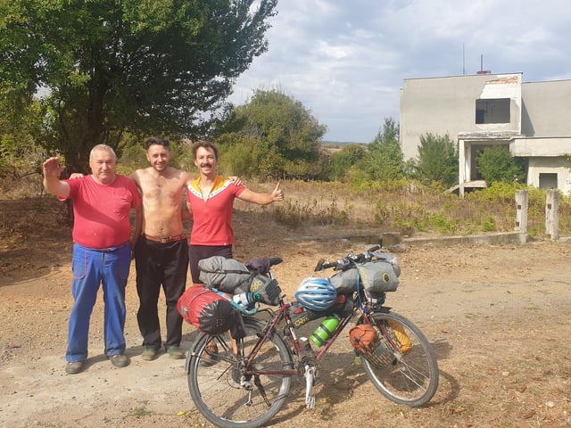 Mike (right) with two of the generous Bulgarians who welcomed him into their homes.