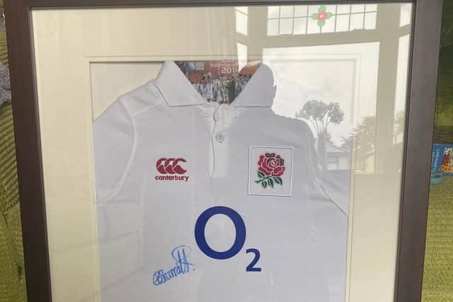 This signed shirt from England rugby star Emily Scarratt, who kicked the winning points in the Women's Six Nations, was one of the items which did arrive