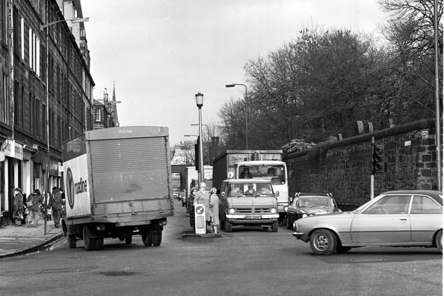Pedestrians stuck on the island as the traffic speeds past at the junction of Ardmillan Terrace and Dalry Road in Edinburgh, February 1980.