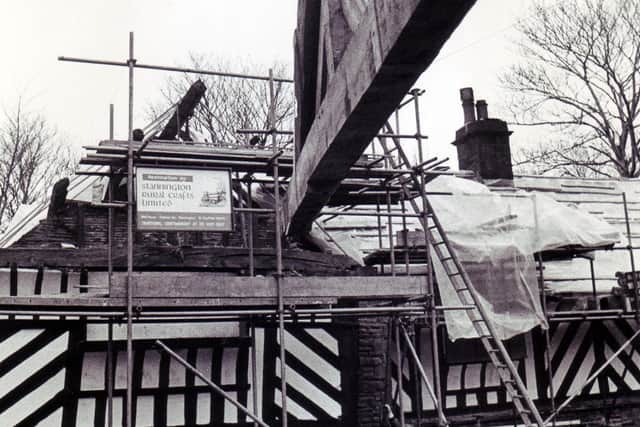 First the gable end came off... and now a new gable end is going on... at The Bishops' House, Meersbrook Park.
The new gable end weighing about one ton, was made by Stannington Rural Crafts, who were busy restoring the Bishops' House - 4th February 1975
