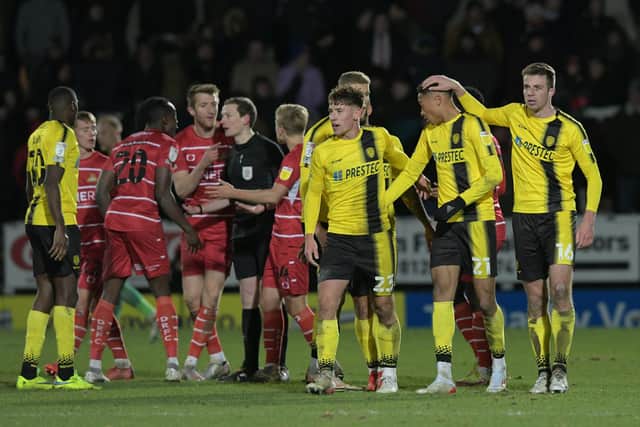 Burton Albion striker Daniel Jebbison, on loan from Sheffield United, is congratulated by his teammates after scoring against Doncaster Rovers: Howard Roe/AHPIX LTD