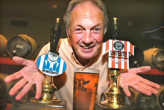 Dave Wickett, of Kelham Island Brewery, with two footballing brews at Steel City Beer Festival.