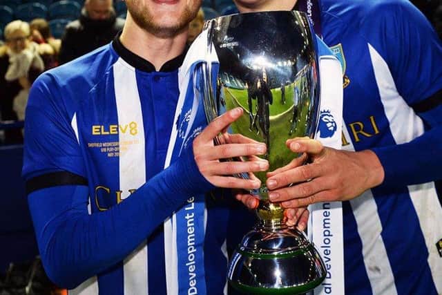 Liam Waldock and Liam Shaw celebrate after winning the PDL2 National Play-Off Final at Hillsborough.