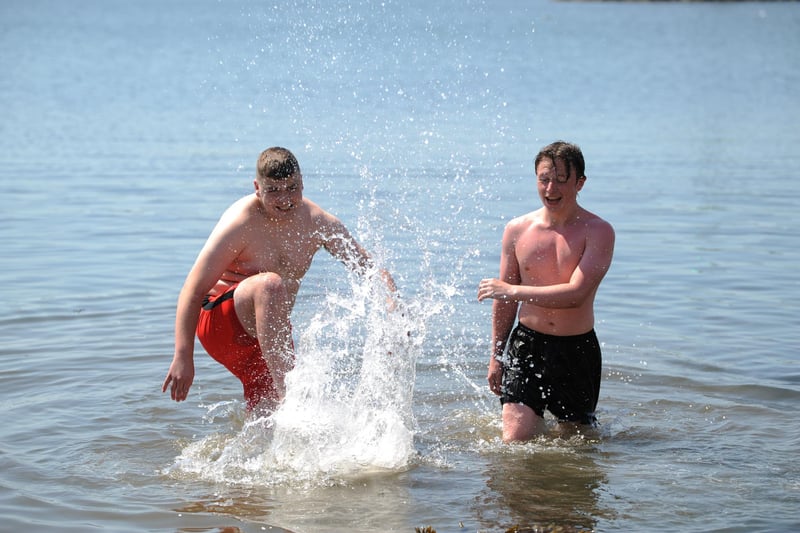Naill Allen and Ben Taylor, enjoying the hot weather at Hartlepool Headland's Fishsands.